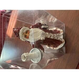 Nantucket Santa clause holding candle figure